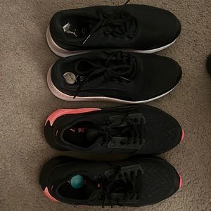 Two pairs of Puma shoes